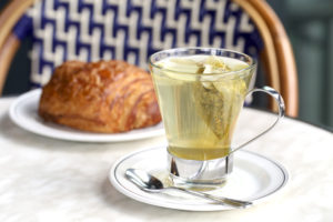 A flaky croissant and cup of tea are a luscious, light breakfast or afternoon snack.