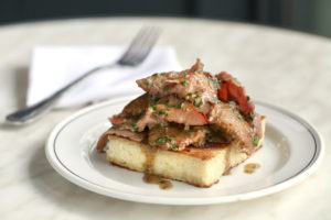 B&B’s chicken liver toast is served with crispy ham and an earthy jus.