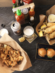 Fried clams, fish and chips and crispy oyster sliders are among Island’s Creek Oyster Bar’s fresh-from-the-sea treats.