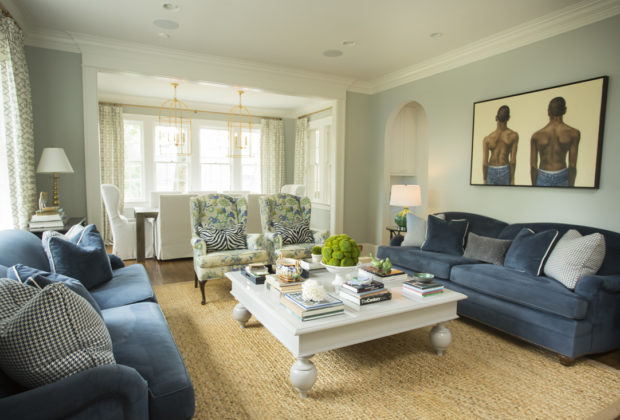 Shades of white and blue keep the living room feeling fresh and timeless.