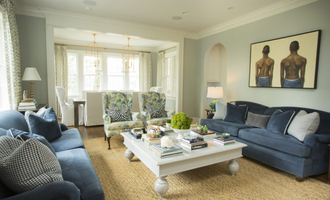Shades of white and blue keep the living room feeling fresh and timeless.