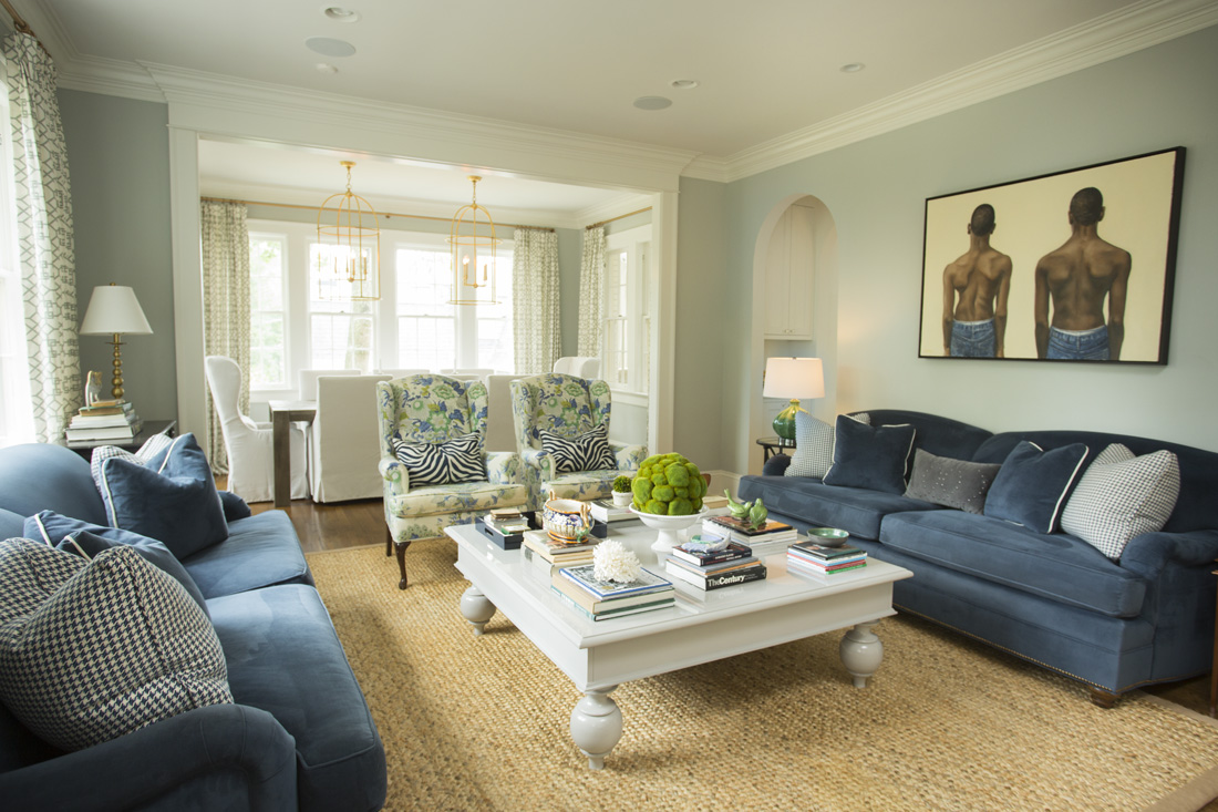 Shades of white and blue keep the living room feeling fresh and timeless.