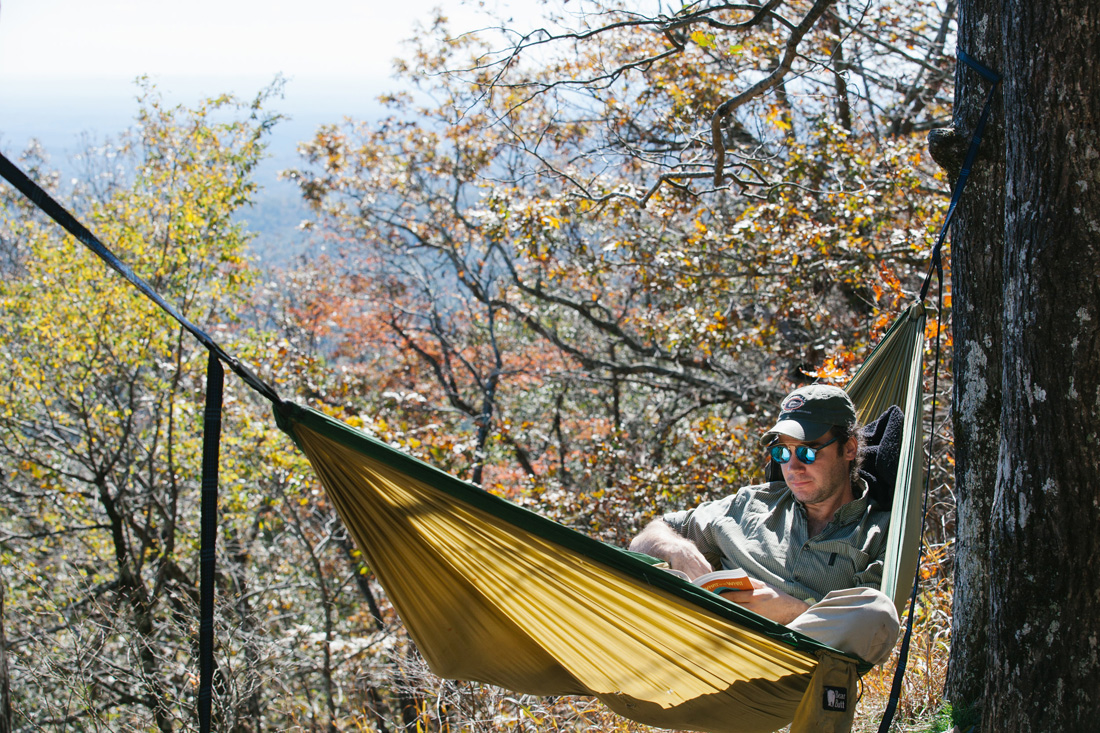 The author takes a book break along the Benton MacKaye Trail.